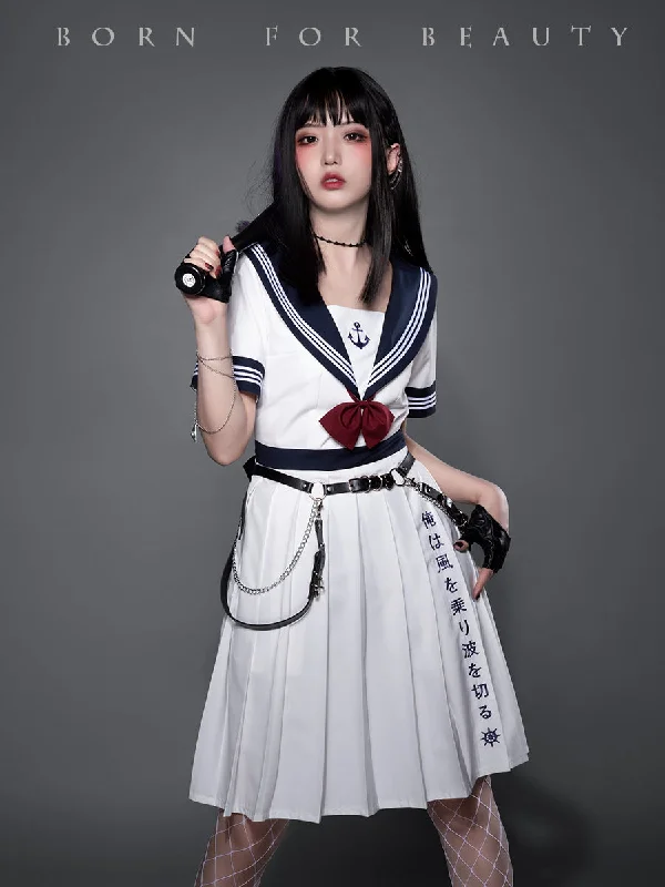 white dress dark blue collar (with embroidery on hemline )